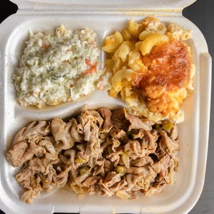Chitterlings dinner tray with coleslaw and mac & cheese